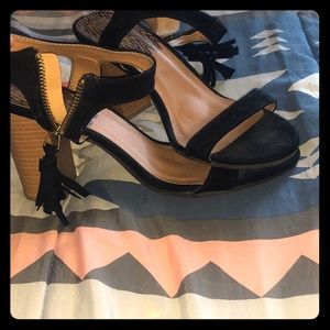 Black high heels with fringe zipper. Size 8